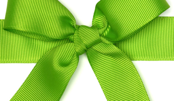 green ribbon tied into a bow