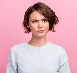woman with exaggerated frown 