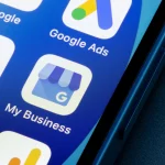 editorial use only; close up of Google My Business phone icon on smartphone screen