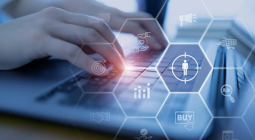 hands on keyboard overlaid with buyer's journey graph